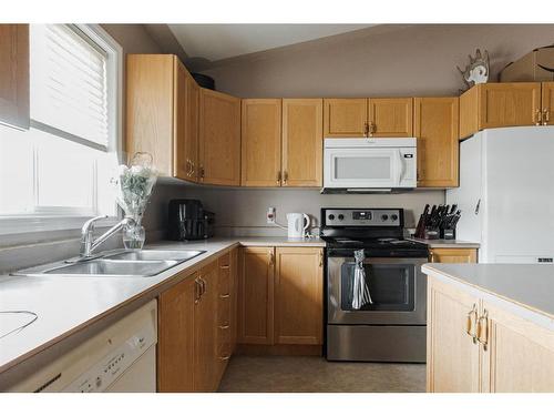 180 Webb Drive, Fort Mcmurray, AB - Indoor Photo Showing Kitchen With Double Sink