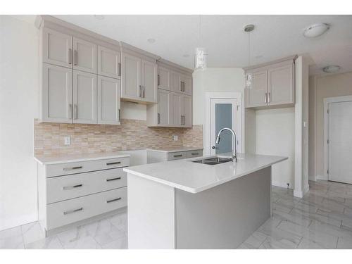 213 Siltstone Place, Fort Mcmurray, AB - Indoor Photo Showing Kitchen With Upgraded Kitchen