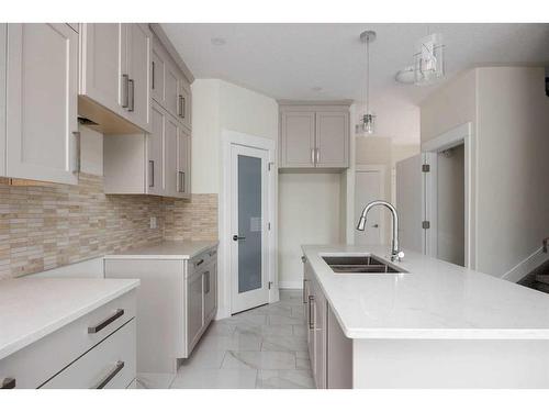 213 Siltstone Place, Fort Mcmurray, AB - Indoor Photo Showing Kitchen With Double Sink With Upgraded Kitchen