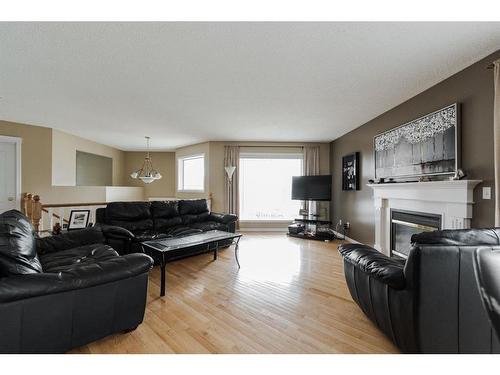 188 Warren Road, Fort Mcmurray, AB - Indoor Photo Showing Living Room With Fireplace