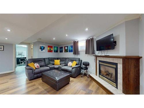 454 Athabasca Avenue, Fort Mcmurray, AB - Indoor Photo Showing Living Room With Fireplace