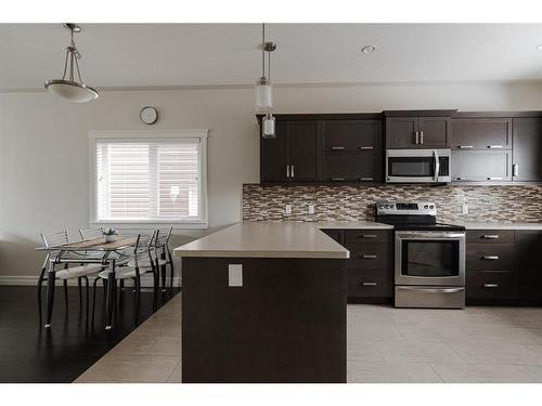 125 Chalifour Street, Fort Mcmurray, AB - Indoor Photo Showing Kitchen With Upgraded Kitchen