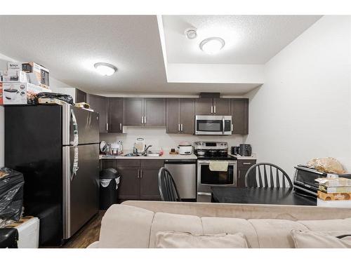 125 Chalifour Street, Fort Mcmurray, AB - Indoor Photo Showing Kitchen With Stainless Steel Kitchen With Double Sink