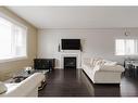 125 Chalifour Street, Fort Mcmurray, AB  - Indoor Photo Showing Living Room With Fireplace 