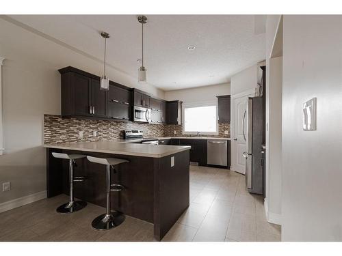 125 Chalifour Street, Fort Mcmurray, AB - Indoor Photo Showing Kitchen With Upgraded Kitchen