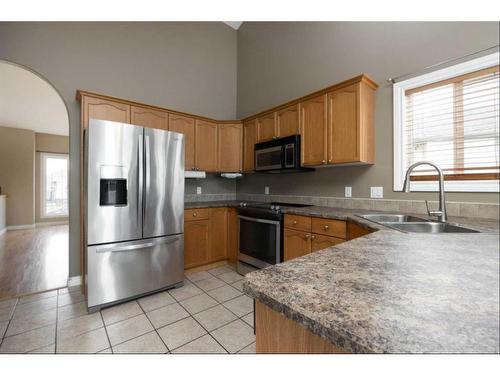 145 Crown Creek Lane, Fort Mcmurray, AB - Indoor Photo Showing Kitchen With Double Sink