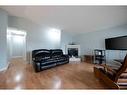 197 Swanson Crescent, Fort Mcmurray, AB  - Indoor Photo Showing Living Room With Fireplace 