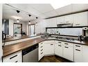 160 Cowley Bay, Fort Mcmurray, AB  - Indoor Photo Showing Kitchen With Double Sink 