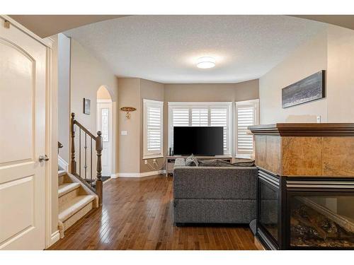 229 Hawthorn Way, Fort Mcmurray, AB - Indoor Photo Showing Living Room With Fireplace
