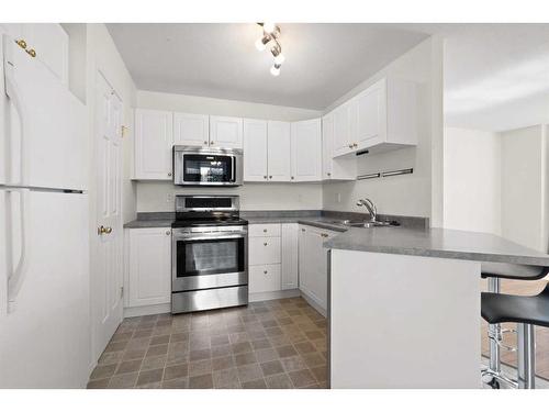 144 Parry Crescent, Fort Mcmurray, AB - Indoor Photo Showing Kitchen With Double Sink