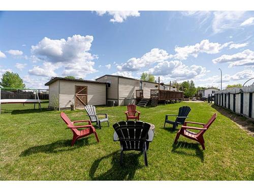 180 Greenwich Lane, Fort Mcmurray, AB - Outdoor With Backyard