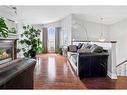 252 Crown Creek, Fort Mcmurray, AB  - Indoor Photo Showing Living Room With Fireplace 