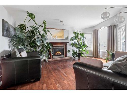 252 Crown Creek, Fort Mcmurray, AB - Indoor Photo Showing Living Room With Fireplace