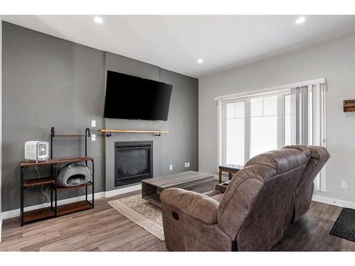 728 Athabasca Avenue, Fort Mcmurray, AB - Indoor Photo Showing Living Room With Fireplace