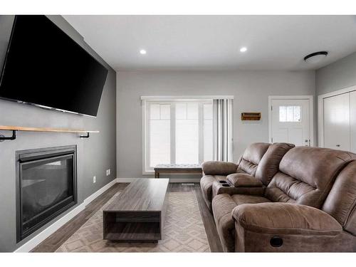 728 Athabasca Avenue, Fort Mcmurray, AB - Indoor Photo Showing Living Room With Fireplace