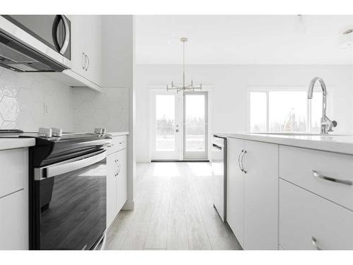 113 Hodgins Avenue, Fort Mcmurray, AB - Indoor Photo Showing Kitchen With Upgraded Kitchen