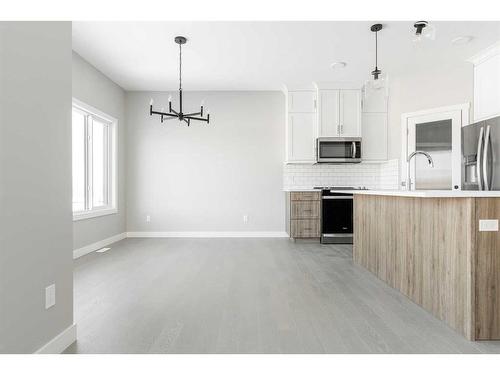 117 Hodgins Avenue, Fort Mcmurray, AB - Indoor Photo Showing Kitchen With Upgraded Kitchen