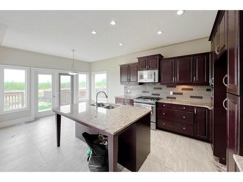 240 Fireweed Crescent, Fort Mcmurray, AB - Indoor Photo Showing Kitchen With Double Sink