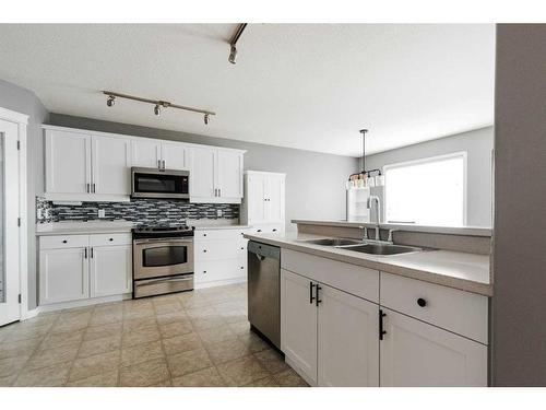 339 Warren Road, Fort Mcmurray, AB - Indoor Photo Showing Kitchen With Double Sink