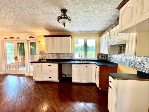 15549  Township Road 694, Plamondon, AB - Indoor Photo Showing Kitchen With Double Sink