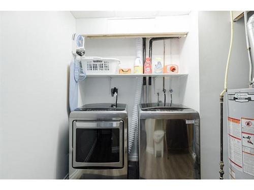 154 Maclaren Crescent, Fort Mcmurray, AB - Indoor Photo Showing Laundry Room