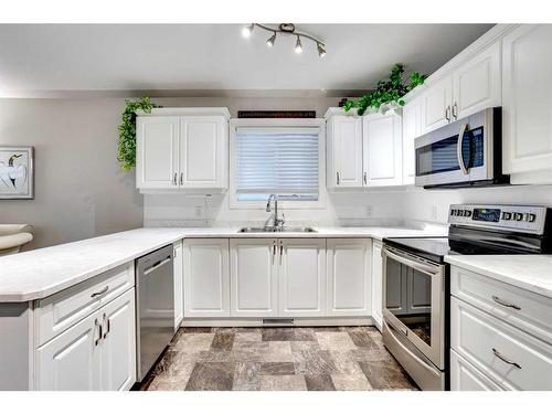 108 Williams Drive, Fort Mcmurray, AB - Indoor Photo Showing Kitchen With Double Sink