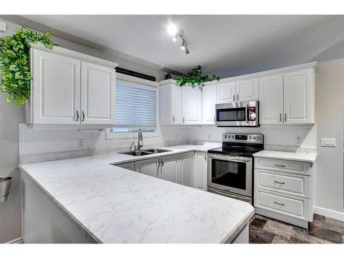 108 Williams Drive, Fort Mcmurray, AB - Indoor Photo Showing Kitchen With Double Sink