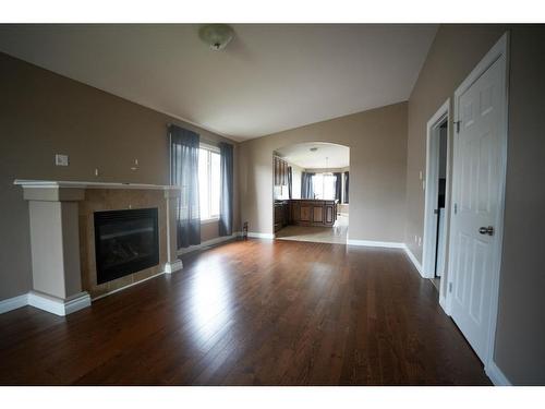 533 Walnut Crescent, Fort Mcmurray, AB - Indoor Photo Showing Living Room With Fireplace