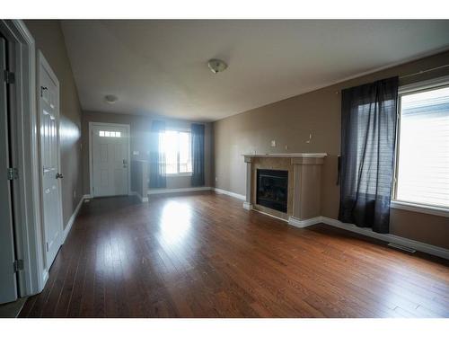 533 Walnut Crescent, Fort Mcmurray, AB - Indoor Photo Showing Other Room With Fireplace