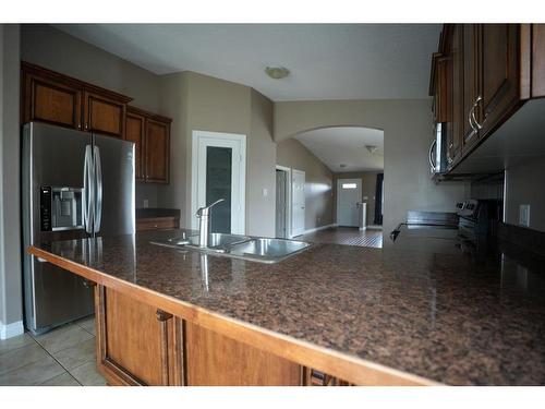 533 Walnut Crescent, Fort Mcmurray, AB - Indoor Photo Showing Kitchen With Double Sink