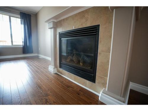 533 Walnut Crescent, Fort Mcmurray, AB - Indoor Photo Showing Living Room With Fireplace