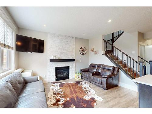 162 Athabasca Crescent, Fort Mcmurray, AB - Indoor Photo Showing Living Room With Fireplace