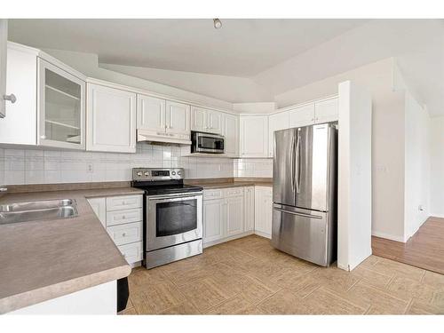 105 Atkinson Road, Fort Mcmurray, AB - Indoor Photo Showing Kitchen With Stainless Steel Kitchen With Double Sink