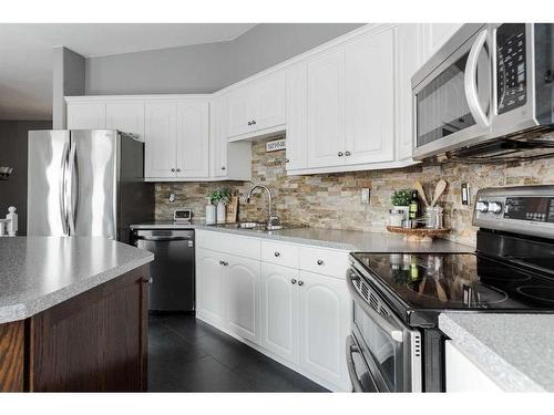 251 Atkinson Lane, Fort Mcmurray, AB - Indoor Photo Showing Kitchen With Stainless Steel Kitchen