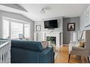 251 Atkinson Lane, Fort Mcmurray, AB  - Indoor Photo Showing Living Room With Fireplace 