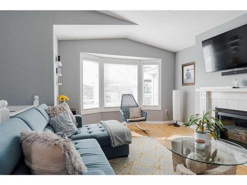 251 Atkinson Lane, Fort Mcmurray, AB - Indoor Photo Showing Living Room With Fireplace