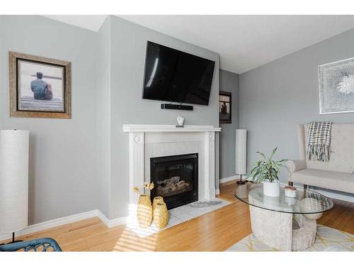 251 Atkinson Lane, Fort Mcmurray, AB - Indoor Photo Showing Living Room With Fireplace