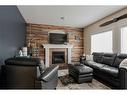 135 Crane Place, Fort Mcmurray, AB  - Indoor Photo Showing Living Room With Fireplace 