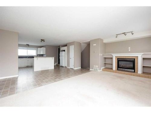 2-220 Swanson Crescent, Fort Mcmurray, AB - Indoor With Fireplace