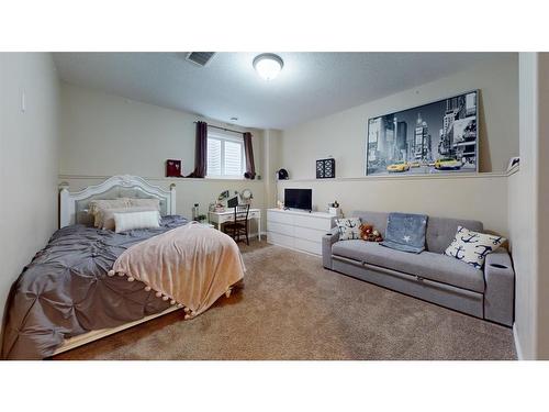 205 Elm Street, Fort Mcmurray, AB - Indoor Photo Showing Bedroom