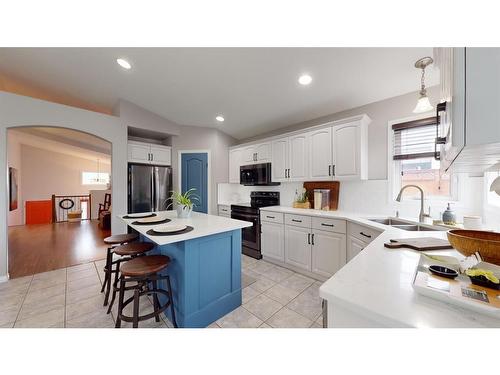 205 Elm Street, Fort Mcmurray, AB - Indoor Photo Showing Kitchen With Double Sink