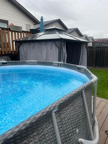 205 Elm Street, Fort Mcmurray, AB - Outdoor With Above Ground Pool