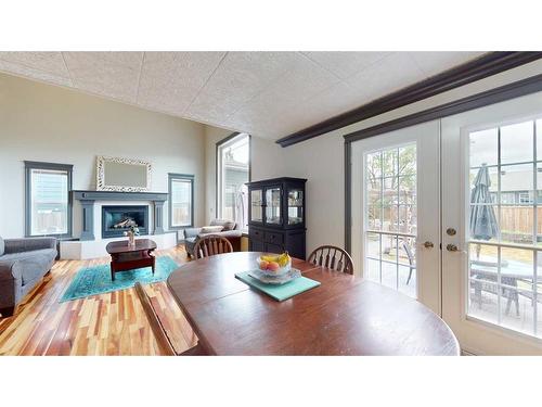 307 Berard Crescent, Fort Mcmurray, AB - Indoor Photo Showing Dining Room With Fireplace