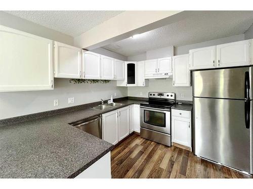 240 Windsor Drive, Fort Mcmurray, AB - Indoor Photo Showing Kitchen With Double Sink