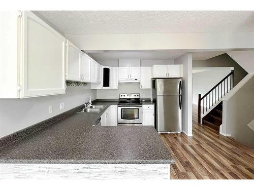 240 Windsor Drive, Fort Mcmurray, AB - Indoor Photo Showing Kitchen With Double Sink