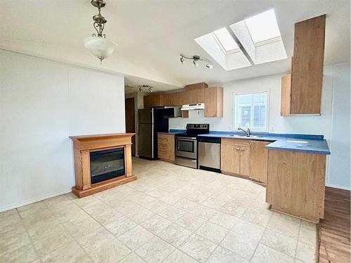 188 Mustang Road Se, Fort Mcmurray, AB - Indoor Photo Showing Kitchen With Double Sink