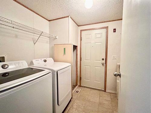 188 Mustang Road Se, Fort Mcmurray, AB - Indoor Photo Showing Laundry Room