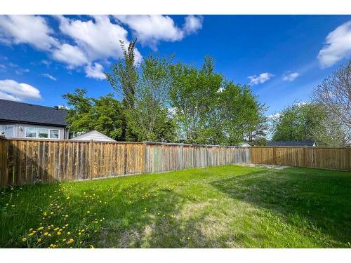 180 Bussieres Drive, Fort Mcmurray, AB - Outdoor With Backyard