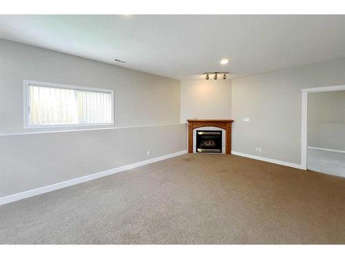 180 Bussieres Drive, Fort Mcmurray, AB - Indoor With Fireplace