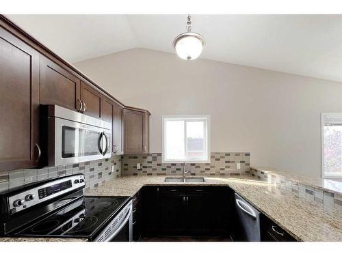 180 Bussieres Drive, Fort Mcmurray, AB - Indoor Photo Showing Kitchen